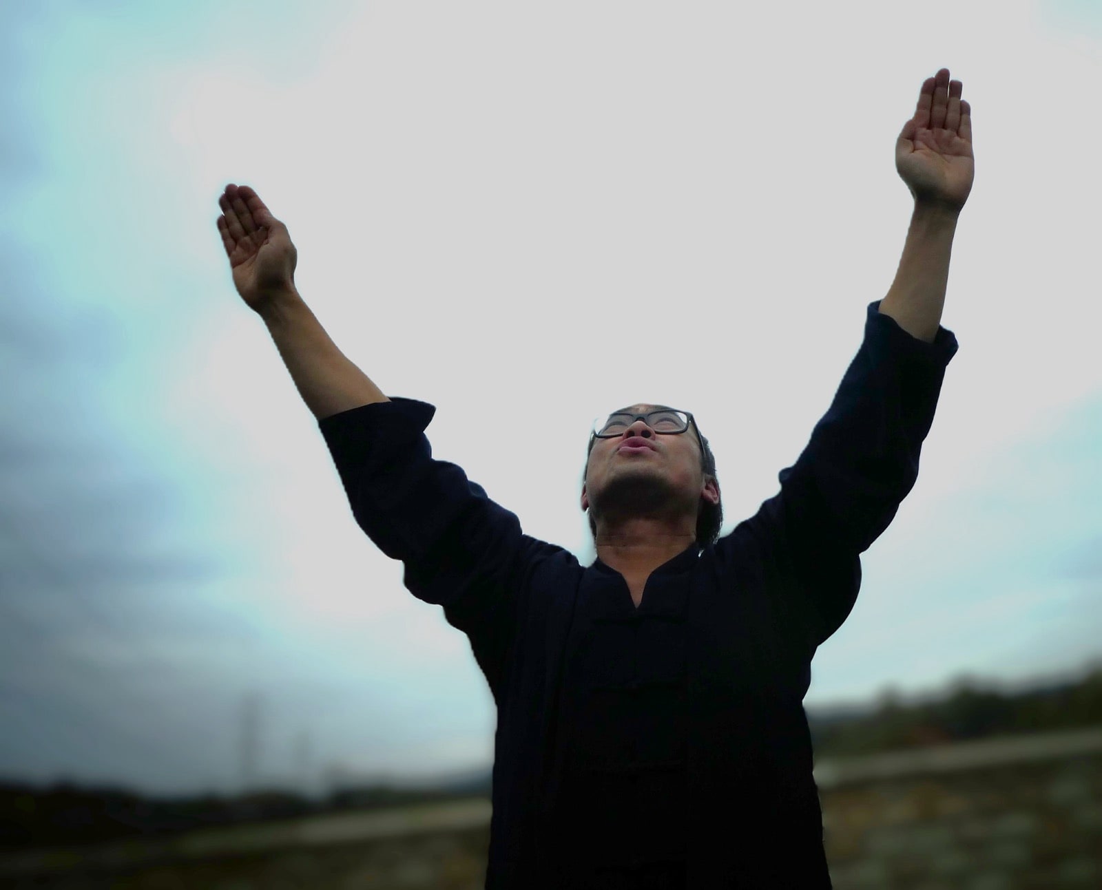 Student at Sea Cloud Hall practising Happy Days daoyin breathwork